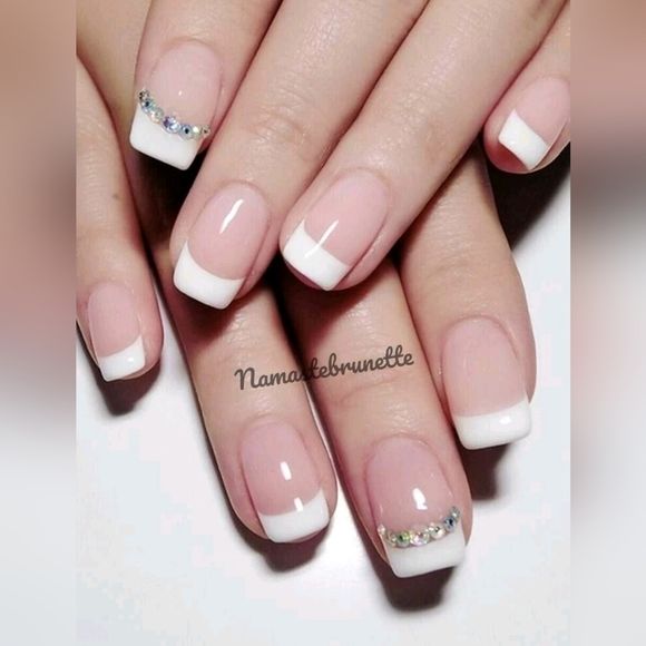 Modern Elegance: A Chic French Manicure with Rhinestone Accents