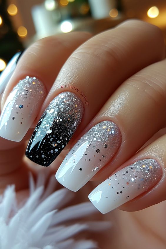 Elegant Gradient Nail Design: Striking White-to-Black Transition with Glitter Accents