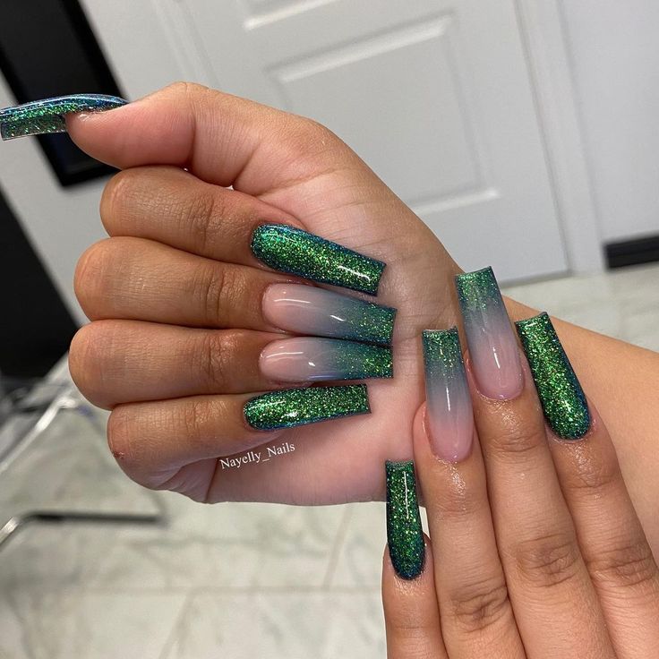 Bold Gradient Green Nail Art with Glitter and Geometric Designs.