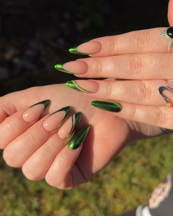 Sophisticated Almond-Shaped Nail Design with Nude and Vibrant Green Accents.