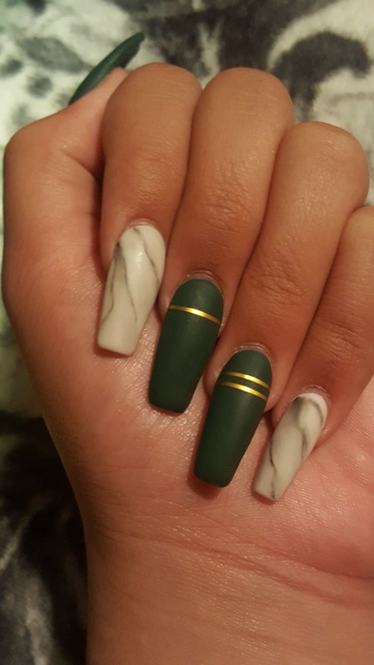 Elegant Matte Green and Marble Nail Design with Gold Accents.