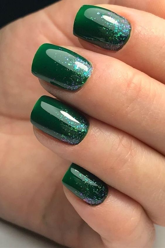 Sophisticated Gradient Green Nails with Captivating Glitter Tips