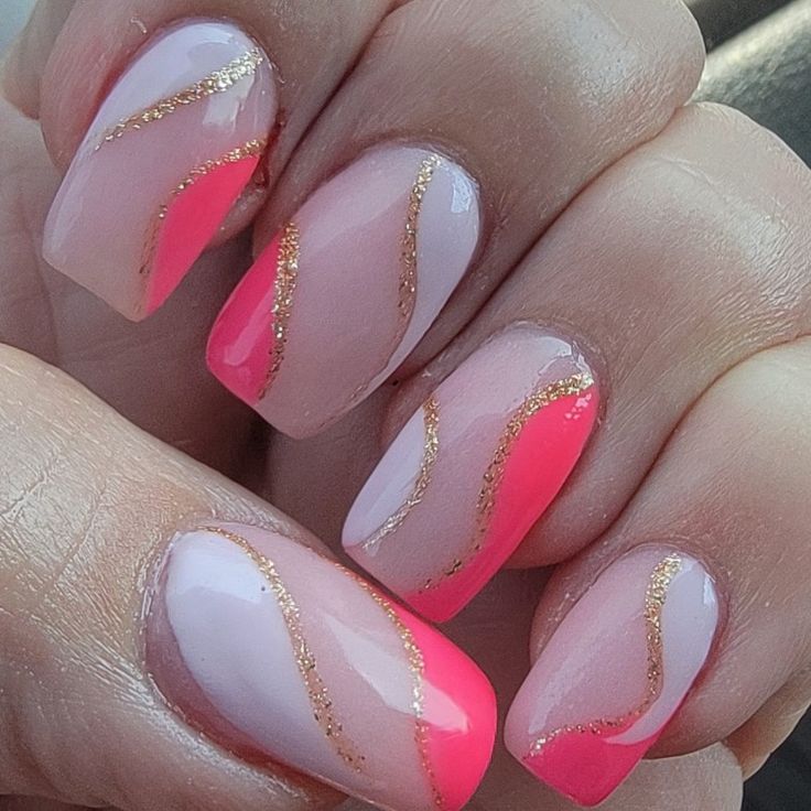 Elegant Pink and Coral Nail Design with Gold Accents