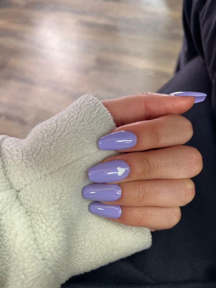 Elegant Glossy Lavender Oval Nail Design for Any Occasion.