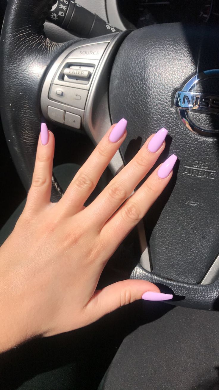 Sophisticated Lavender Nails Contrast Elegantly with Sleek Car Interior