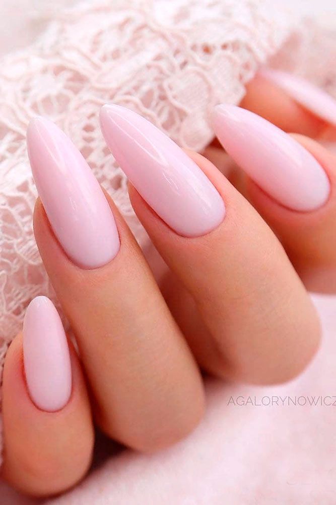 Sophisticated Blush Pink Stiletto Nails for Versatile Elegance.