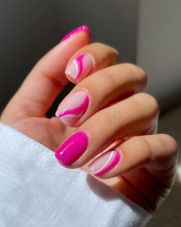 Vibrant Pink Nail Design with Glossy Finish and Playful White Accents.