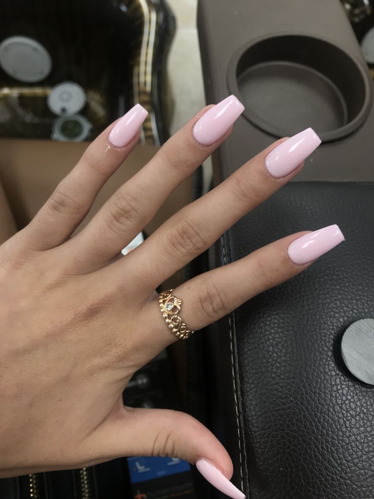 Chic Pastel Pink Square Nails: A Sophisticated Accent for Any Occasion.