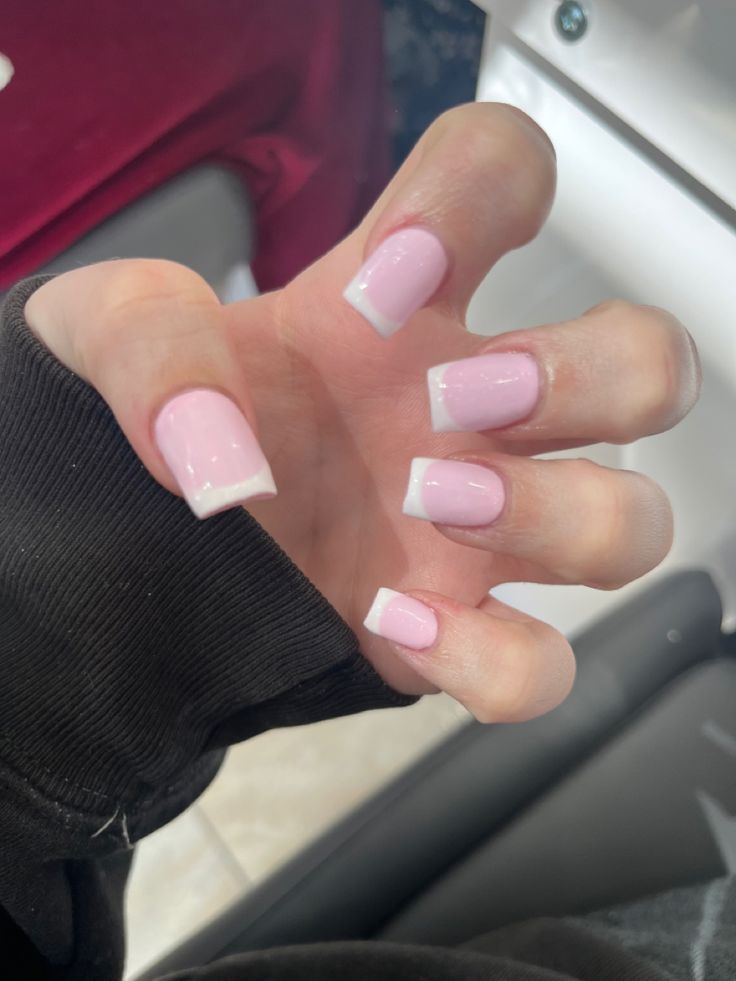 Chic Soft Pink and White Tip Nail Design for Elegant Occasions.