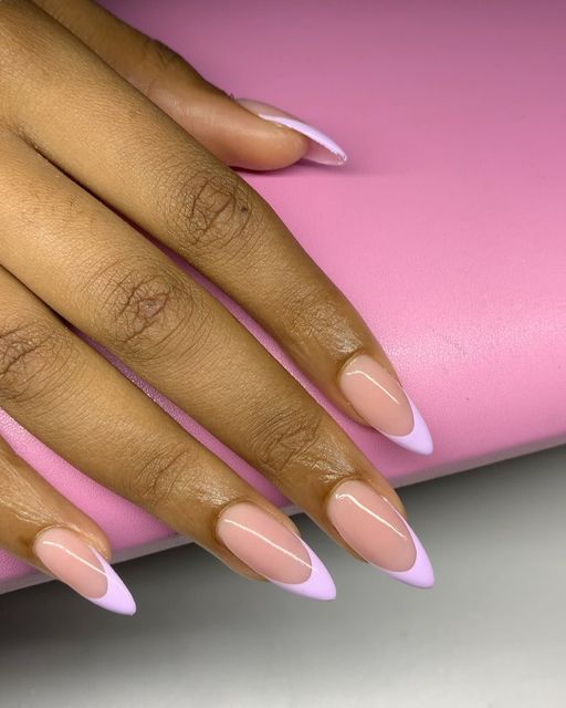 Chic Almond-Shaped Nails: Soft Nude Base with Lavender Tips and Sophisticated White Line.