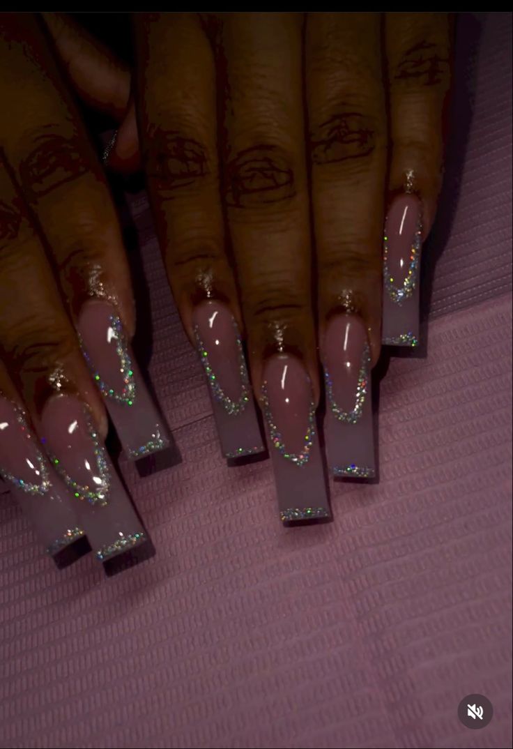 Elegant Gradient Long Nails with Glitter Embellishments for a Sophisticated Yet Playful Look.