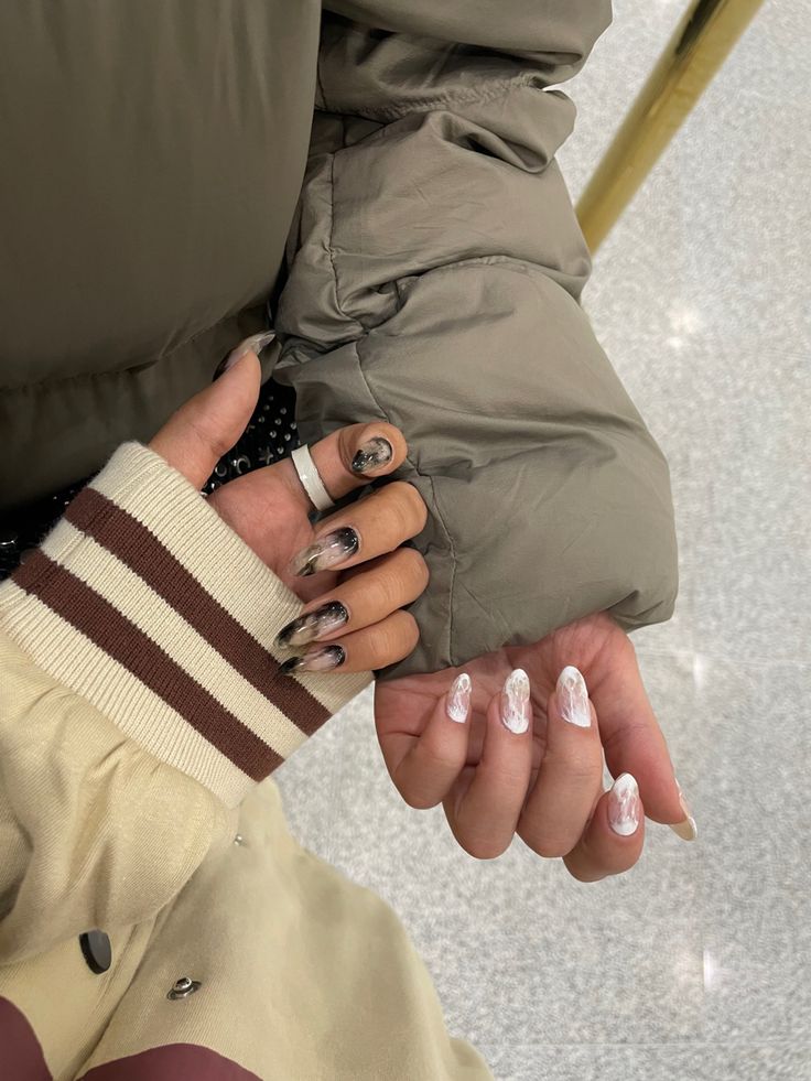 Chic Winter Nail Designs: A Fusion of Neutral Tones and Contemporary Patterns.