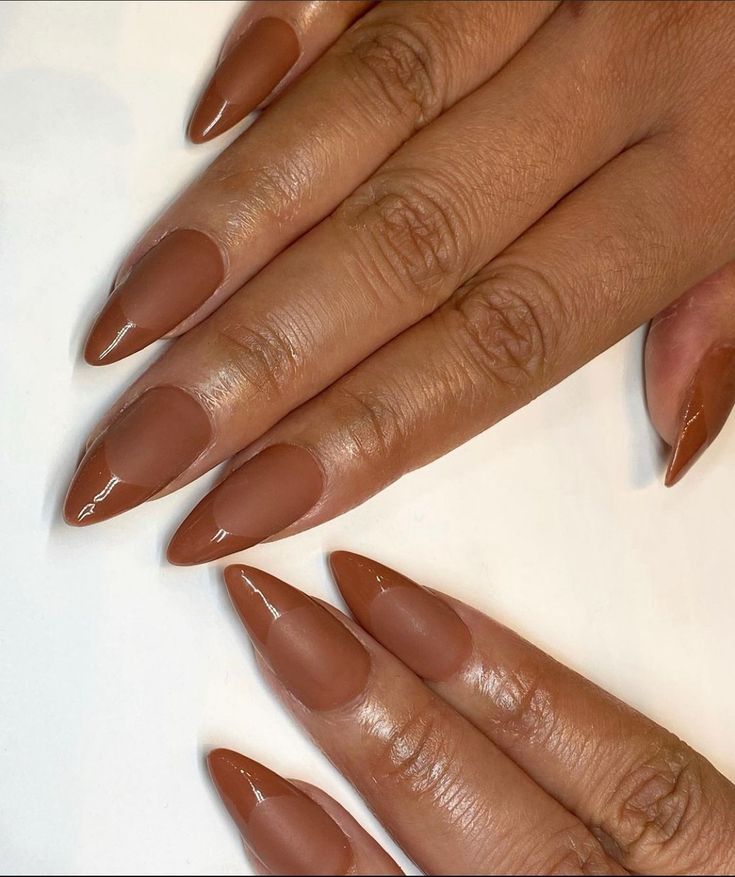 Elegant Almond-Shaped Nails: Glossy Warm Brown for Chic Versatility.