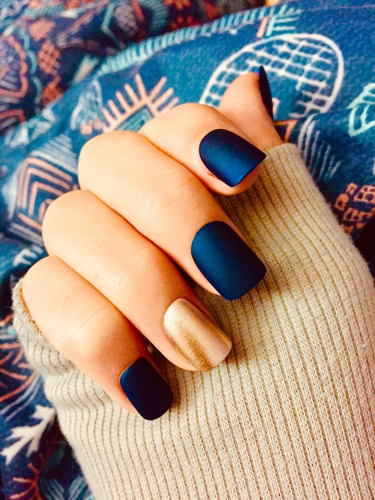 Elegant Matte Navy Nail Design with Striking Gold Glitter Accent