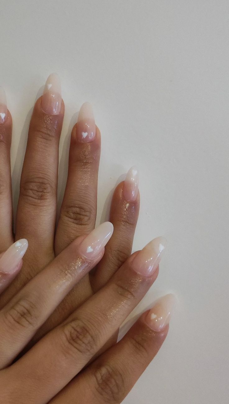 Chic Almond-Shaped Nail Design with Soft Nude and White Gradient for Versatile Elegance.