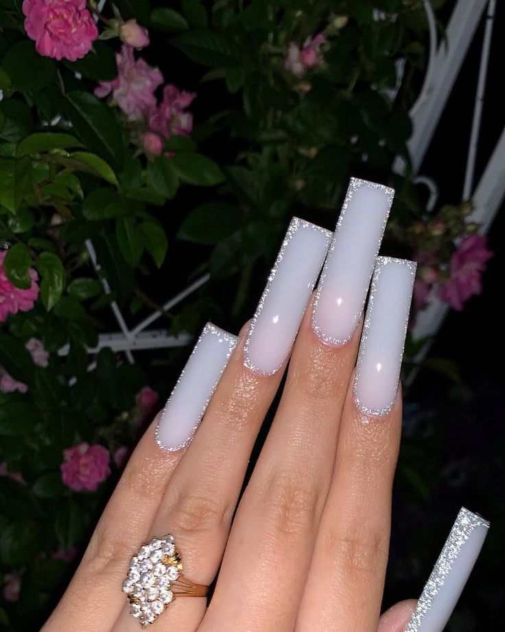 Chic Ombre Long Nails with Sparkling Silver Accents and a Glamorous Statement Ring.