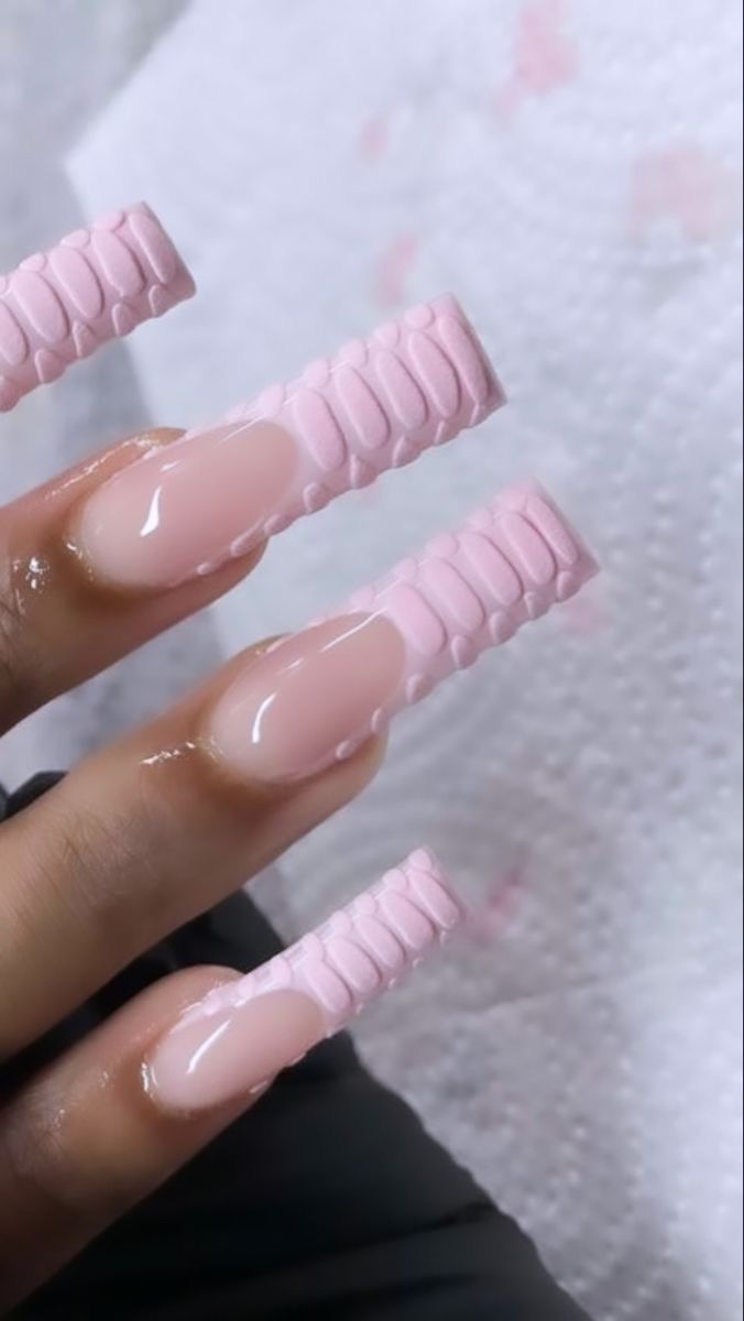 Elegant Textured Soft Pink Nail Design with Creative Patterns