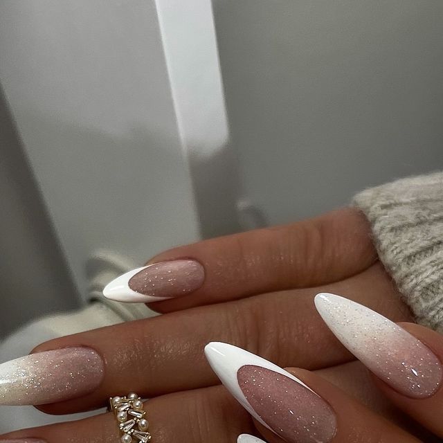 Elegant Almond-Shaped Manicure with White and Soft Pink Gradient and Shimmer.