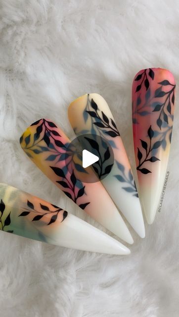 Elegant Pastel Gradient Nail Design with Black Leaf Patterns