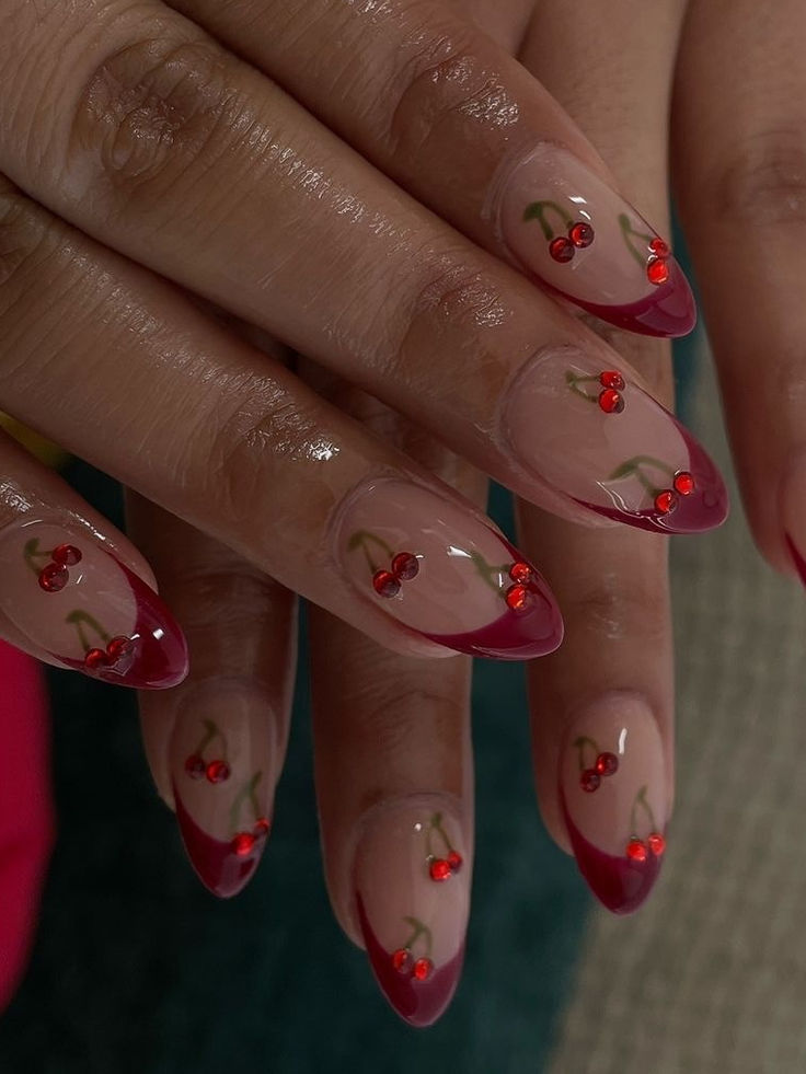 Whimsical Cherry-Inspired Nail Design with Nude Base and Red Tips