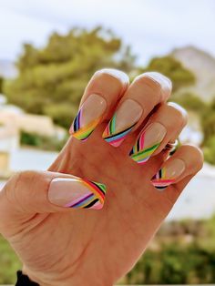 Vibrant Diagonal Stripe Nail Design: A Playful Summer Statement.