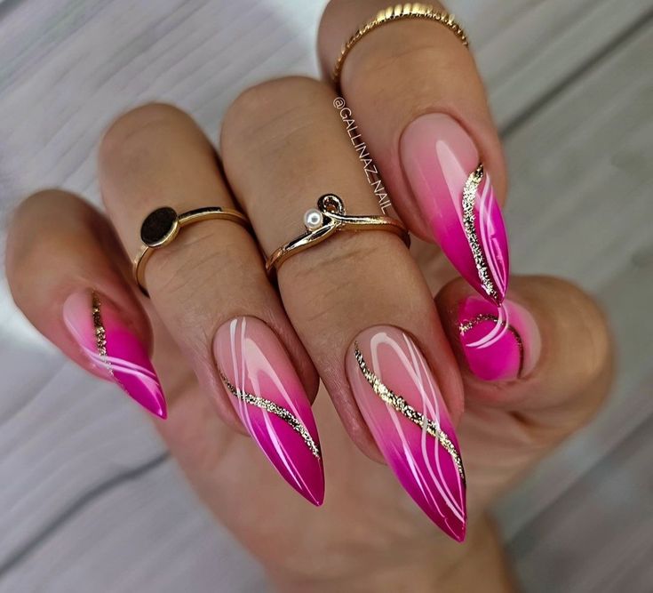 Elegant Ombre Nail Design with Pink Gradients, White Swirls, and Gold Accents.