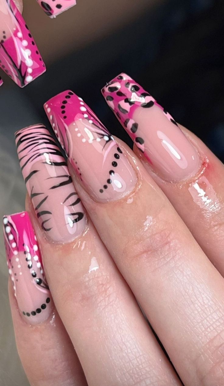 Vibrant Pink Animal Print Nail Design: Stylish Elegance in Glossy Finish.