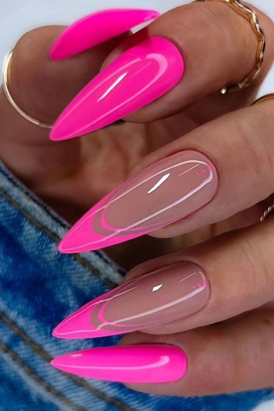 Bold Vibrant Pink Stiletto Nails: A Chic Statement for Daring Nail Lovers