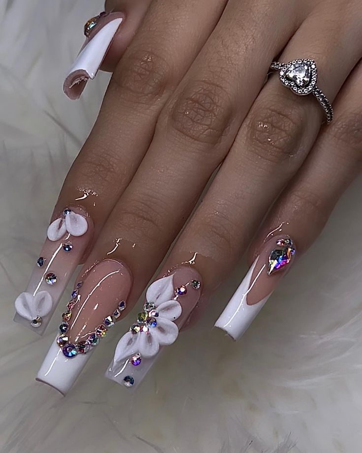 Elegant Long Square Nail Design with Pastels, Floral Appliques, and Gem Accents