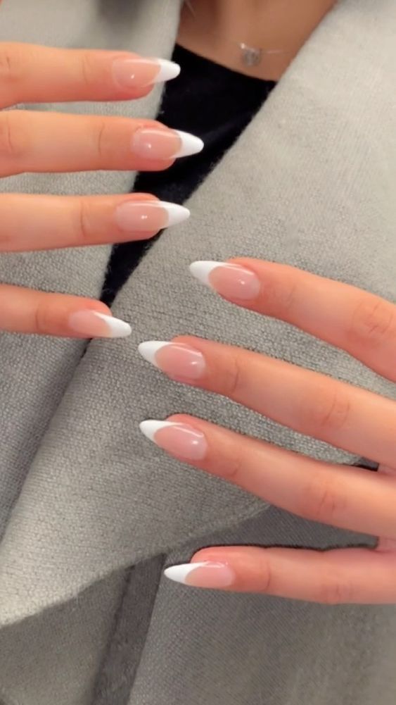 Elegant French Manicure with Almond-Shaped Nails for Timeless Gracefulness.