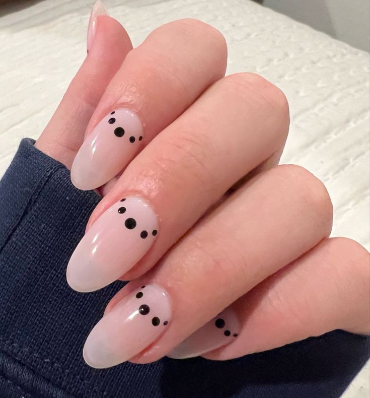 Chic Ombre Nail Design with Playful Black Dots for a Minimalist Touch