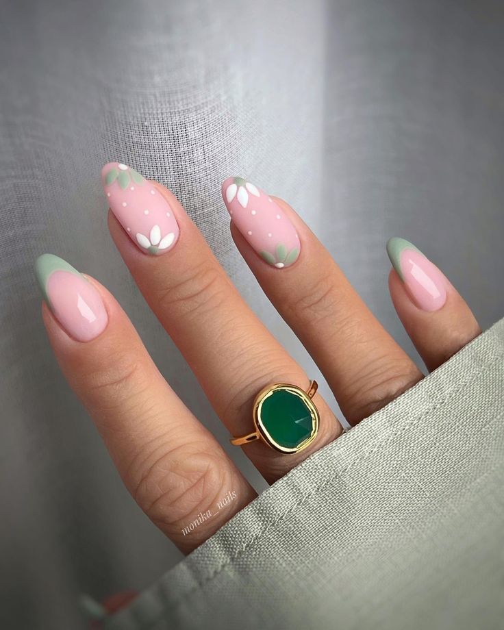 Playful Elegant Nail Design with Soft Pink, Mint Green Tips, and Floral Accents.