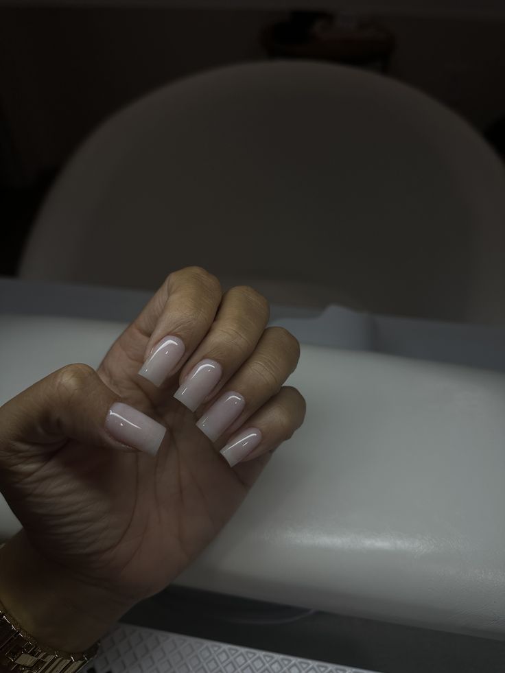 Chic Ombre Nude Nails: Glossy Finish with Square Tips for Understated Elegance.