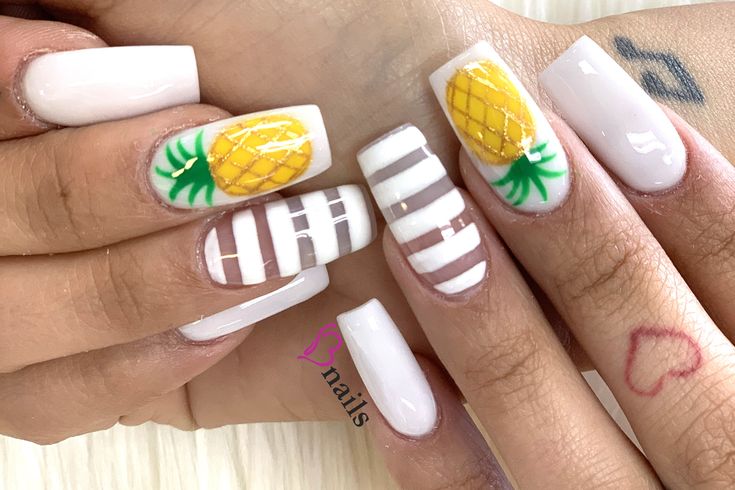 Playful Pineapple Nail Design: A Vibrant Tropical Flair with Geometric Stripes