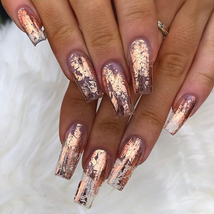 Elegant Metallic Rose Gold and Nude Nail Art with Textured Reflective Finish