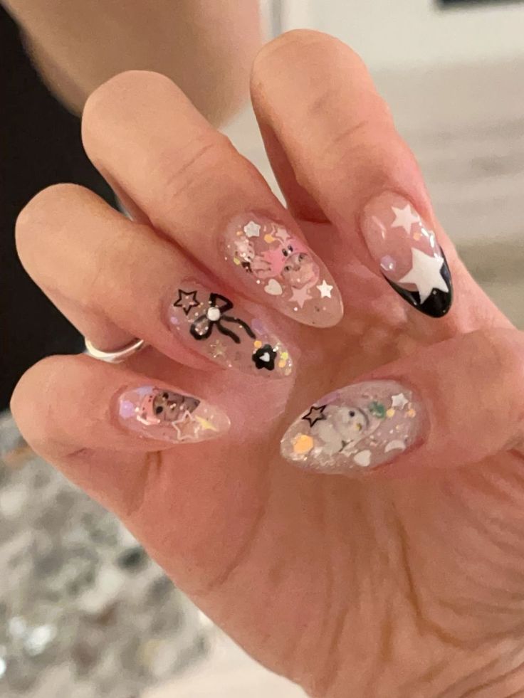 Playful and Whimsical Colorful Nail Art with Unique Designs and Embellishments.