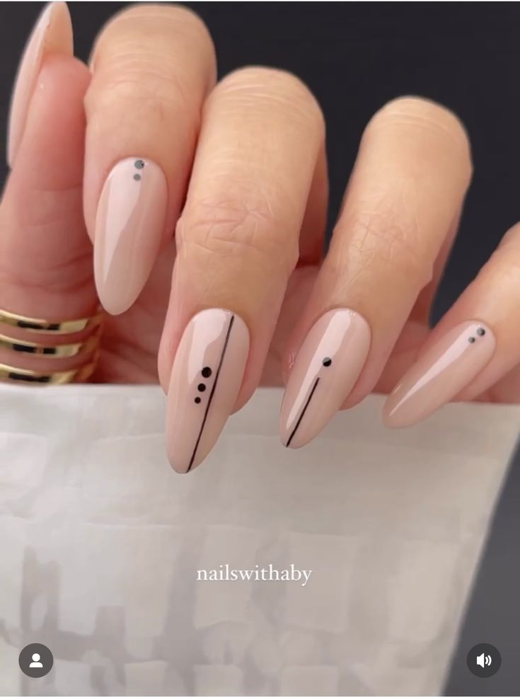 Sleek Nude Nail Design with Modern Minimalistic Accents