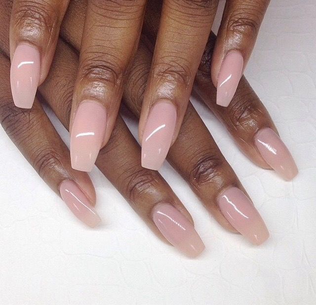 Sophisticated Elegant Nude Nails: Glossy Finish and Elongated Square Shape for Versatile Elegance.