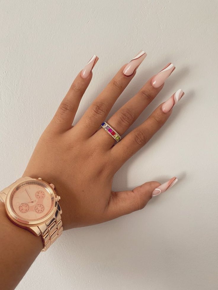 Chic Long Tip Nail Design with Soft Pink Base and White Accents.