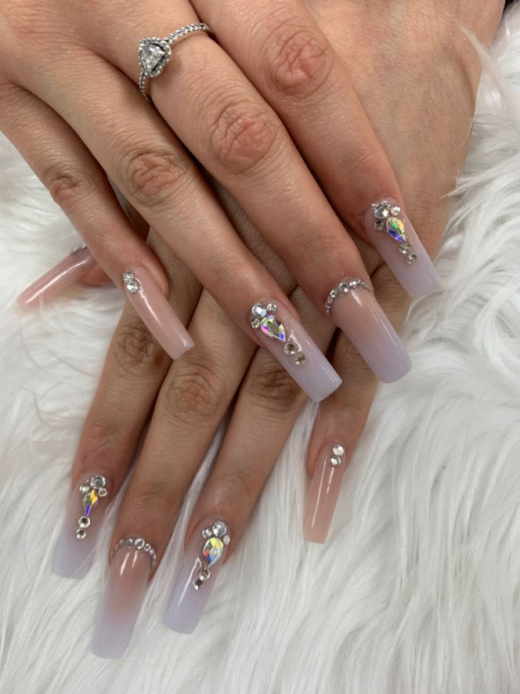 Luxurious Gradient Acrylic Nails with Rhinestones and Unique Edge Embellishments.