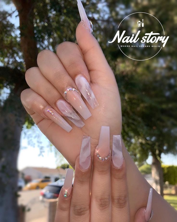 Sophisticated Coffin-Shaped Nails with Soft Ombre and Rhinestone Accents.