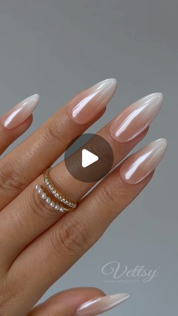 Sophisticated Ombre Almond Nails with Glossy Finish and Delicate Rings for a Chic Look.