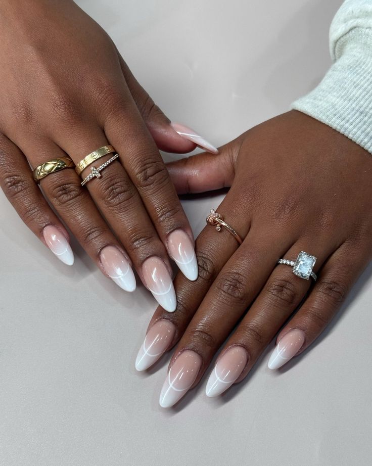 Timeless Elegance: Trendy Almond-Shaped French Tip Nails with Gold and Silver Accessories