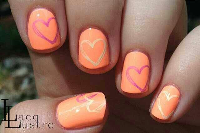 Vibrant Heart-Themed Nail Design: A Cheerful Celebration of Love and Whimsy.