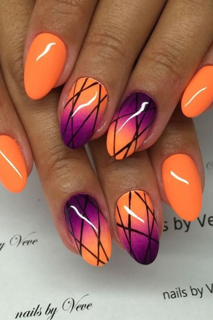 Bold Orange and Purple Nail Design with Geometric Patterns and Gradient Effect