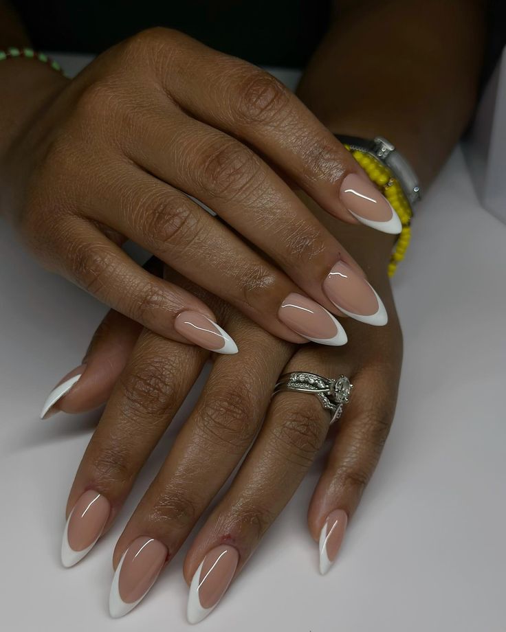 Chic Almond-Shaped Nails: Soft Nude Base with Classic French Tips