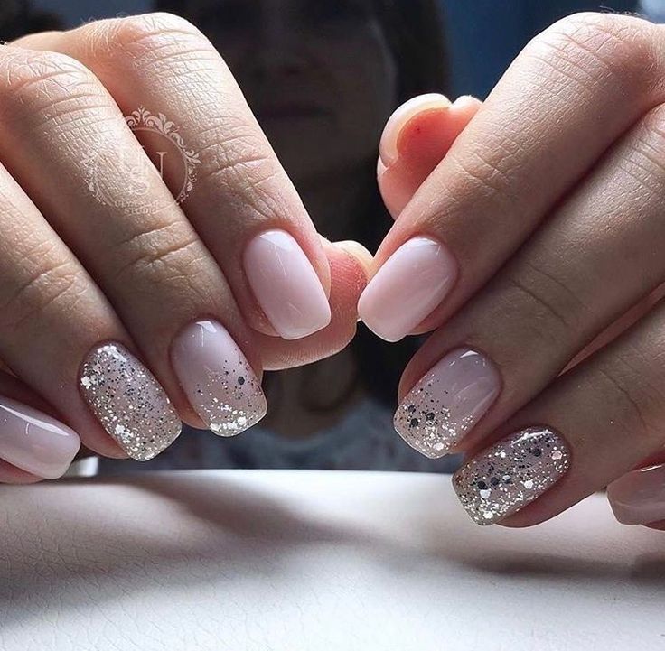 Sophisticated Elegant Nail Design with Shimmering Pink Gradient and Silver Glitter Accents.