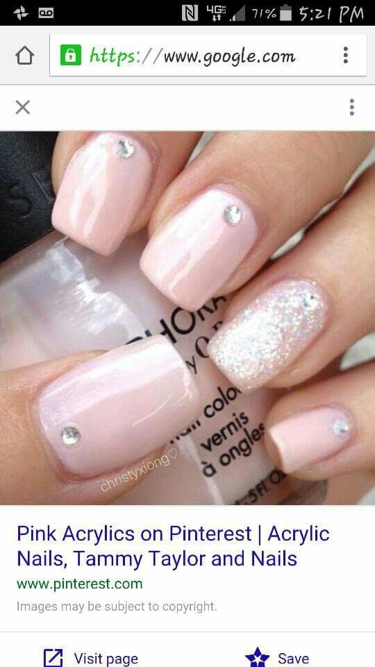 Chic Pink Acrylic Nails with Glittering Accents for Effortless Glamour.