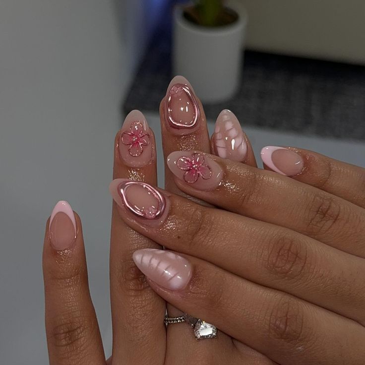 Elegant Floral Pink Almond-Oval Nail Design for a Chic Statement.