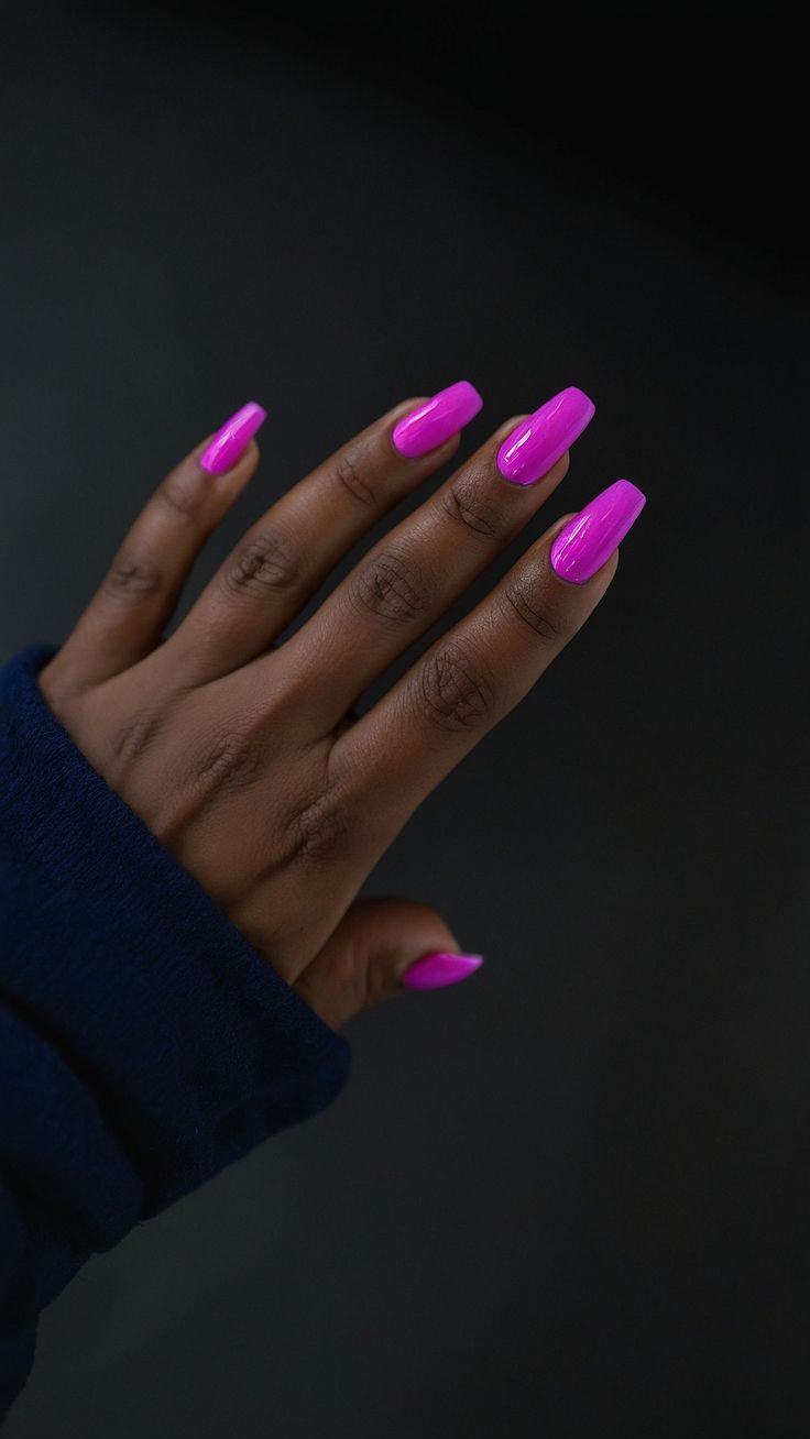 Bold Vibrant Pink Glossy Nails with Modern Square Tips for Eye-catching Style